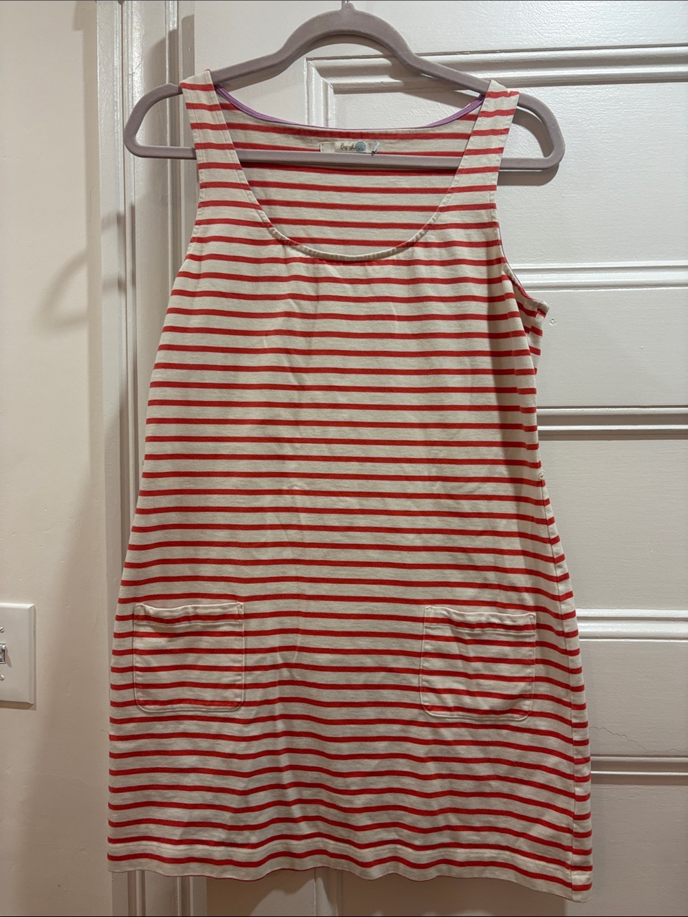 Striped fabric with sewn label